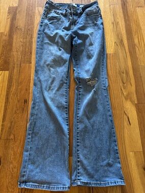 Womens Blue Flare Jeans with Distressed Knee